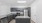 kitchen with grey cabinets, stainless steel appliances, and granite countertops