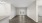 Living room with vinyl wood flooring and doors to balcony