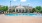 a swimming pool in front of a house