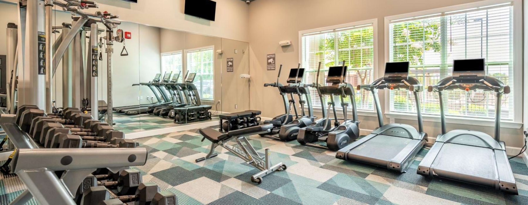 a gym with exercise equipment