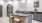 a kitchen with a marble counter top
